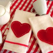 Saying “I love you!” doesn’t have to cost a bundle this Valentine’s Day. Impress your guests with this adorable little tea towel {Pottery Barn inspired} for only $0.79! Read the easy tutorial with free printable pattern at BrenDid.com. The easy craft uses premade flour sack towels and iron-on adhesive. The best part, at under $1 each you can afford to spread the Valentine love around the whole neighborhood! - See more at: https://brendid.com/pb-inspired-valentine-tea-towels/