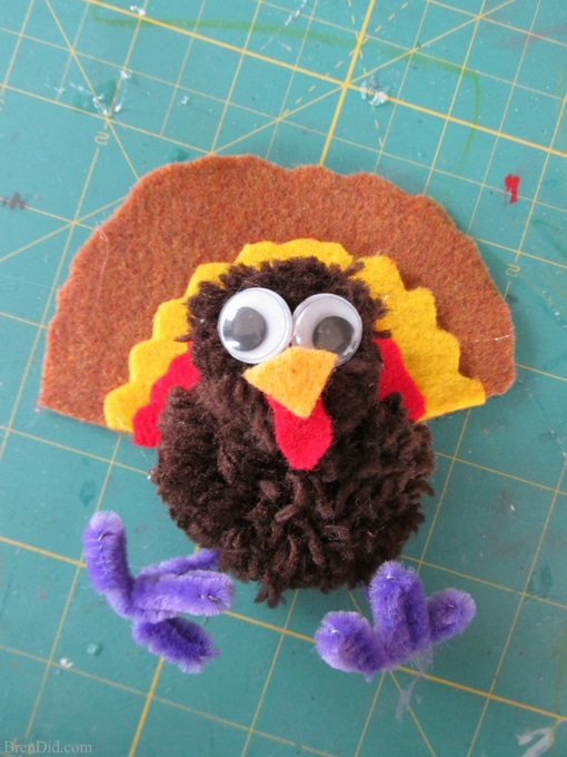 Thanksgiving kid crafts - making yarn pom pom turkeys and Free Birds on Netflix