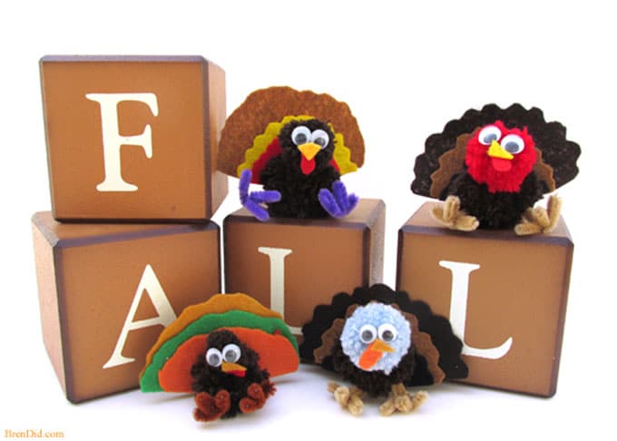 Thanksgiving kid crafts - making yarn pom pom turkeys and Free Birds on Netflix