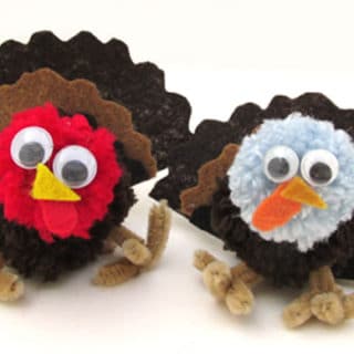 Thanksgiving kid crafts - making yarn pom pom turkeys and Free Birds on Netflix
