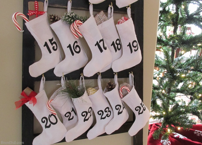 Pinning to make for Christmas! Easy and Affordable Christmas Decorations: PB inspired Wooden Advent Calendar with Stockings – Make a Pottery Barn Inspired Wooden Advent Calendar Ladder with Canvas Stockings f for $34. That’s 83% off of the retail price of $199. Free printable pattern, Silhouette cut file and easy directions at BrenDid.com.