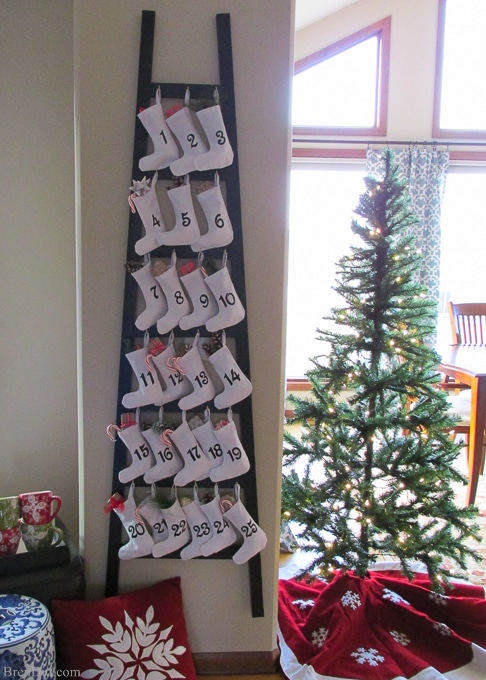 Pinning to make for Christmas! Easy and Affordable Christmas Decorations: PB inspired Wooden Advent Calendar with Stockings – Make a Pottery Barn Inspired Wooden Advent Calendar Ladder with Canvas Stockings f for $34. That’s 83% off of the retail price of $199. Free printable pattern, Silhouette cut file and easy directions at BrenDid.com.