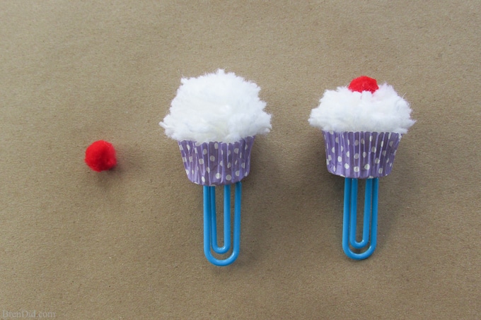 Cupcake Bookmark Craft and Free Printable Valentine Cards from BrenDid -Learn to make pom poms into cute cupcake bookmarks. Easy kids’ craft for Valentine's Day gifts and cards.