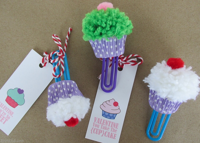 Cupcake Bookmark Craft and Free Printable Valentine Cards from BrenDid -Learn to make pom poms into cute cupcake bookmarks. Easy kids’ craft for Valentine's Day gifts and cards.
