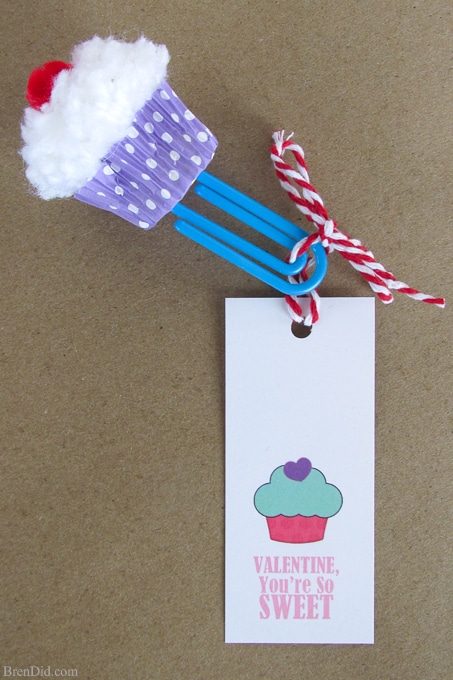 Cupcake Bookmark Craft and Free Printable Valentine Cards from BrenDid -Learn to make pom poms into cute cupcake bookmarks. Easy kids’ craft for Valentine's Day gifts and cards.