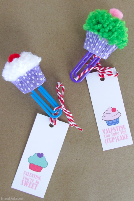 Cupcake Bookmark Craft and Free Printable Valentine Cards from BrenDid -Learn to make pom poms into cute cupcake bookmarks. Easy kids’ craft for Valentine's Day gifts and cards.