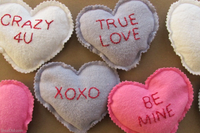 Easy Valentine's Day Craft: Conversation Heart Microwave Homemade Heating Pad - These easy to make heating pads are filled with whole grain rice or kosher salt. They can be heated by placing them in the microwaveor placed in the freezer to use as cool packs. They are all natural, reusable and much healthier than using a chemical filled self warming heat or cold pack.