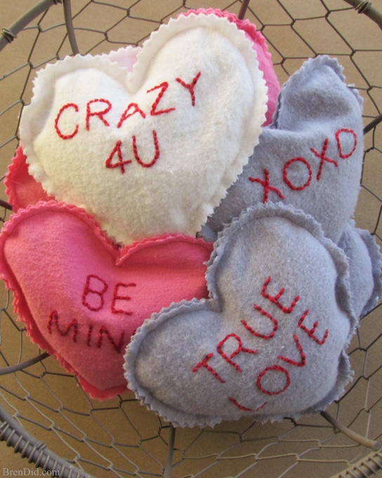 Easy Valentine's Day Craft: Conversation Heart Microwave Homemade Heating Pad - These easy to make heating pads are filled with whole grain rice or kosher salt. They can be heated by placing them in the microwaveor placed in the freezer to use as cool packs. They are all natural, reusable and much healthier than using a chemical filled self warming heat or cold pack.