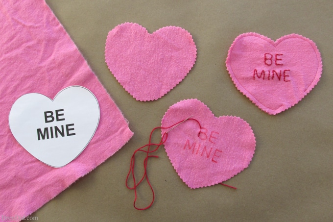 Easy Valentine's Day Craft: Conversation Heart Microwave Homemade Heating Pad - These easy to make heating pads are filled with whole grain rice or kosher salt. They can be heated by placing them in the microwaveor placed in the freezer to use as cool packs. They are all natural, reusable and much healthier than using a chemical filled self warming heat or cold pack.