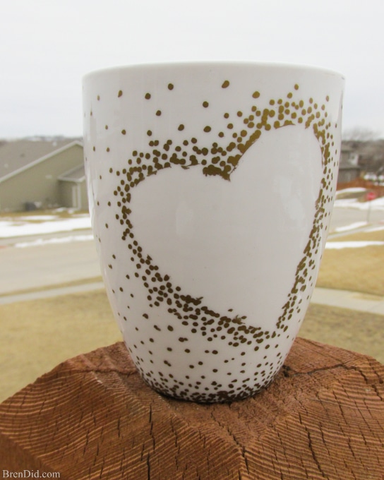 DIY Craft Project: Sharpie Mug Tutorial - Custom heart handle mugs that require no artistic ability or transfers! If you can trace and make dots you can make these mugs! Learn the easy hack! Uses oil based Sharpie paint pens that are baked on. 
