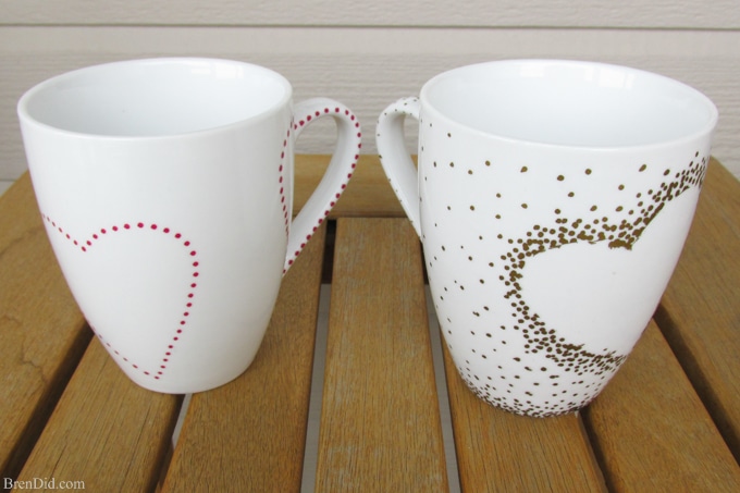 DIY Craft Project: Sharpie Mug Tutorial - Custom heart handle mugs that require no artistic ability or transfers! If you can trace and make dots you can make these mugs! Learn the easy hack! Uses oil based Sharpie paint pens that are baked on. 