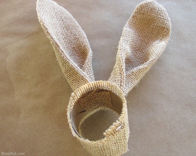 Theses adorable PB Inspired Easter Bunny Napkin Rings add character to any table this spring. They are made of burlap, cardboard and only cost $0.40 each to make. I hope you trying making this easy Easter DIY project and add some whimsy to your Easter décor.