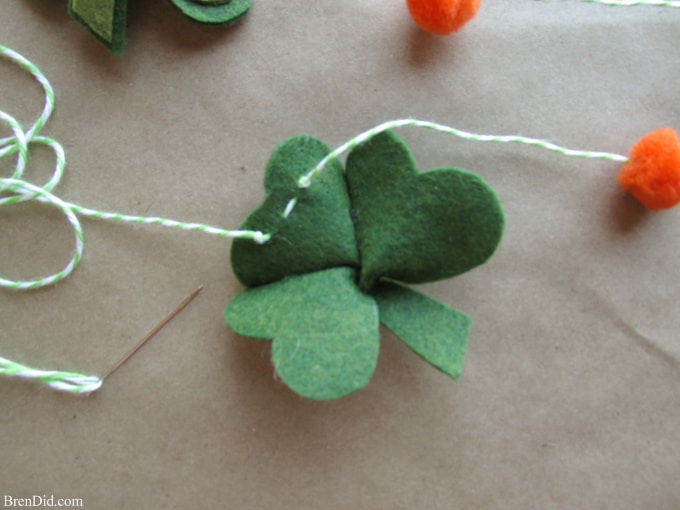 Are you a St. Patrick’s Day lover? Make a fun and easy St. Patrick’s Day Shamrock garland using felt, bakers twine and premade pom poms.