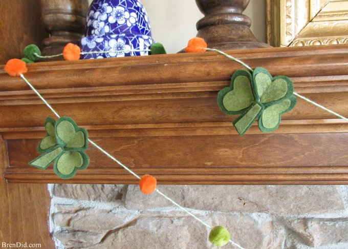 Are you a St. Patrick’s Day lover? Make a fun and easy St. Patrick’s Day Shamrock garland using felt, bakers twine and premade pom poms.