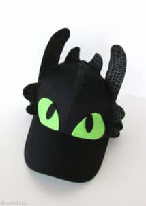 Toothless, Hookfang and Stormyfly hats are ready to fly in for your next family movie night, How to Train Your Dragon party or afternoon craft. This easy craft uses baseball caps and felt to make adorable dragon hats that will thrill and delight any How to Train Your Dragon fan. The hats are fun to make and easy enough for kids to help! 