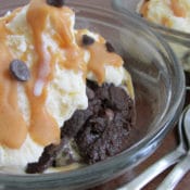 Love cupcakes? You’ll enjoy making these quick microwave cupcakes that are full of chocolate peanut butter flavor but contain no refined white sugar! They are topped with an easy peanut butter magic shell sauce and mini chocolate chips. Add a scoop of your favorite ice cream and you are in dessert heaven!