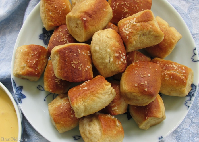 Recipe for Homemade Soft Pretzel Bites – A favorite junk food indulgence is soft pretzel bites: tiny pillows of salty, soft, chewy dough that tempt your taste buds. Make them at home for better-for-you junk food treats that are also easier on the wallet.