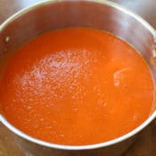 Amazing Tomato Sauce Recipe - This easy homemade tomato sauce uses just a few basic ingredients and can be served over pasta, made into lasagna, or even used a pizza sauce.