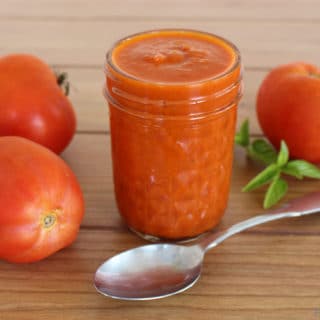 Amazing Tomato Sauce Recipe - This easy homemade tomato sauce uses just a few basic ingredients and can be served over pasta, made into lasagna, or even used a pizza sauce.