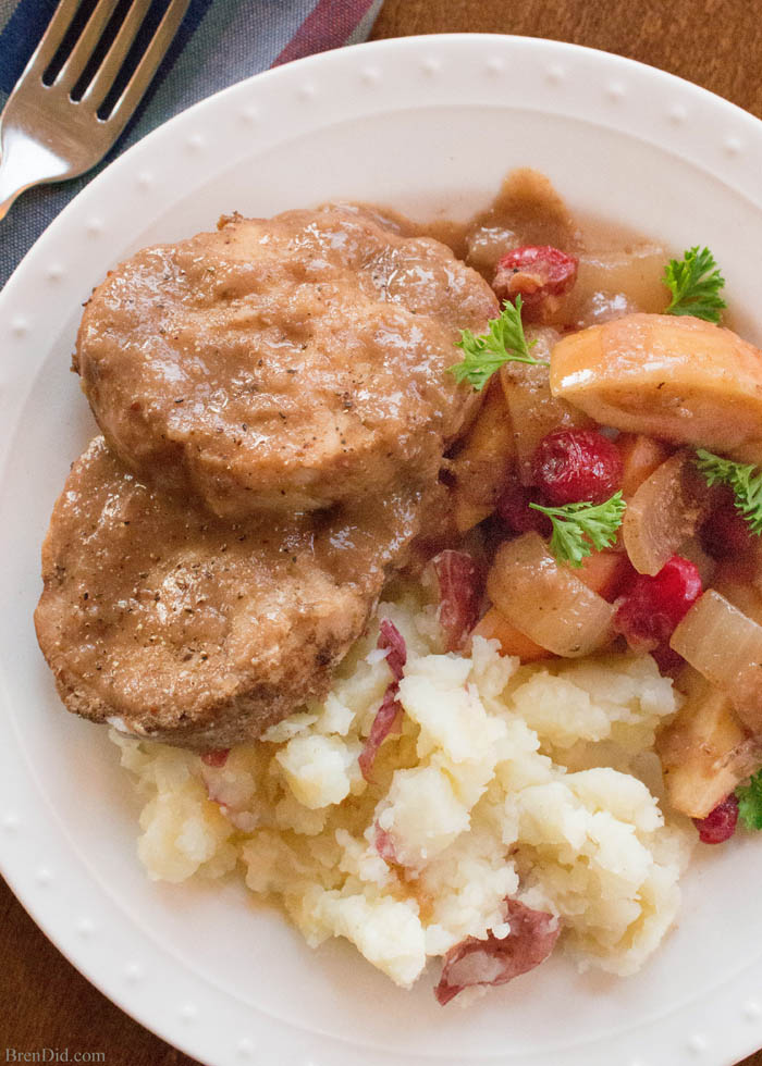 Easy slow cooker recipe. Boneless pork chops or pork ribs simmer with cranberries, onion and apples to create a delicious dish flavored with balsamic vinegar. Healthy crock pot recipe. 