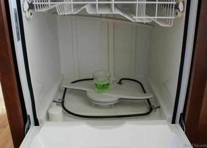 Green clean your dishwasher with this simple tutorial to remove build up, solve drainage problems and keep it sparking clean, and running like new!