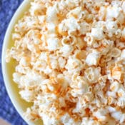 Sriracha Honey Caramel Popcorn is an easy to make sweet and spicy snack that will take your snack break up a notch. It is a pleasing mixture of spicy with sweet that brings out the best of both flavors.