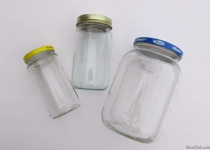 Easy Upcycled Pet Treat Container - Making craft projects from recycled materials is a great way to save on craft costs while reducing waste. These adorable upcycled pet treat jars reuse glass jars from your kitchen. 