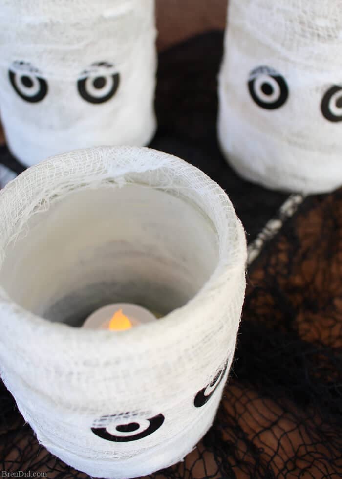 I love Halloween flipping through home decor catalogs for seasonal inspiration but can never quite convince myself to pay the sky-high prices. Learn how I make this easy homemade Halloween decoration that looks like a Pottery Barn candle holder. 