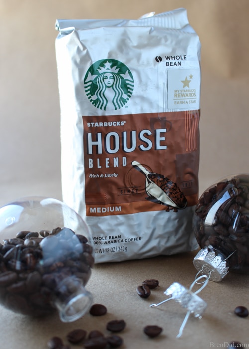 Create the perfect customizable ornament for all the coffee lovers on your gift list with this holiday craft idea, This tutorial for easy coffee bean ornaments is an easy and affordable way to make the season merrier!