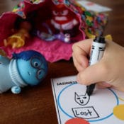 Kids experience a wide range of emotions - anger, sadness, joy, fear, and disgust to name a few - but they do not always have the words or abilities to express these feelings. Help your child learn to talk about emotions by playing my free printable emotions game based on the movie Inside Out. #ad