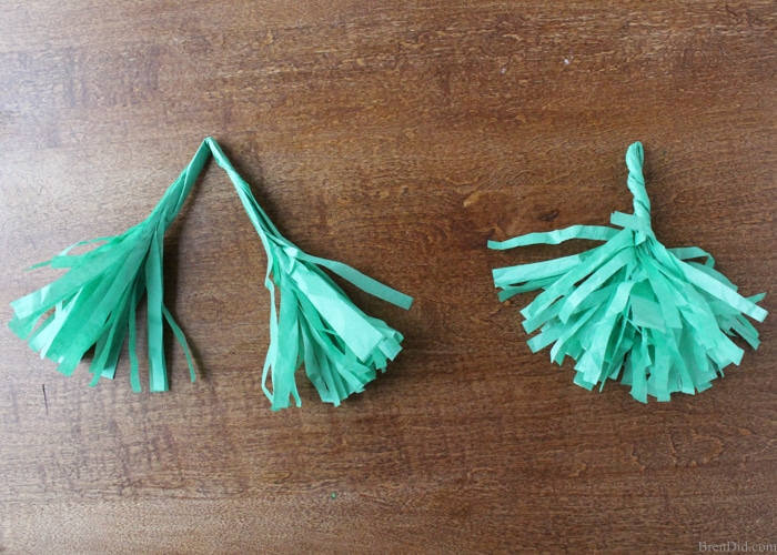 How to Make Tassels from Tissue Paper - Make your own free eco-friendly paper tassels for garlands and gift tie-ons using just tissue paper and scissors. They are a huge DIY trend and they are free by reusing tissue paper!   