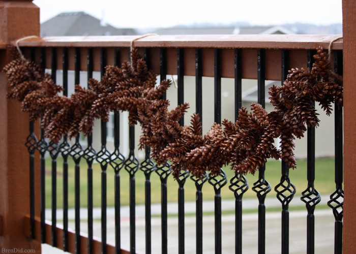 Learn how to make an pine cone garland for a touch of woodland style. This easy tutorial shows you how to create your own easy pine cone garland for less than $1.30 per foot. Eco-friendly.