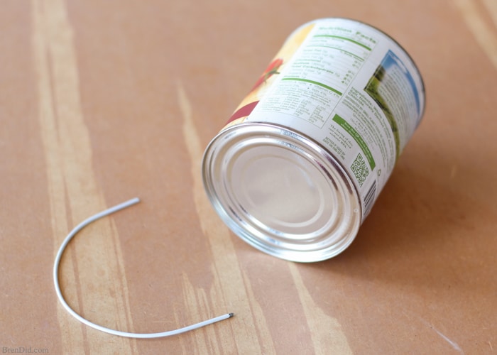 Upcycled Craft Ideas for Valentines Day. Learn how to make an adorable tin lantern from an upcycled tin can! These easy DIY lanterns are made from just two recycled craft supplies: a tin can and a wire coat hanger. Perfect for rustic wedding, Valentines Day or a romantic décor. The Art Of Up-Cycling: repurposed tin cans to lanterns. 