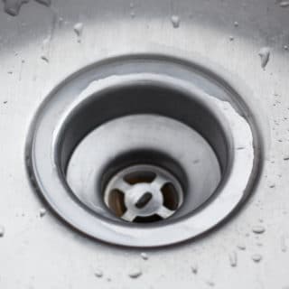 Want to naturally unclog a sink or clean a slow moving drain? Learn why you should not use baking soda and vinegar to clean your drains and what green solutions really work!