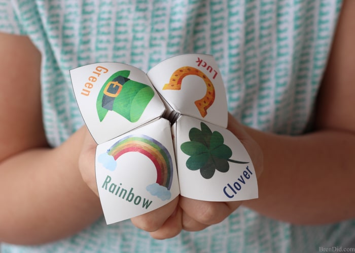A joke teller is a great St. Patrick’s Day treat for kids. The free printable project (with easy folding instructions) takes less than 5 minutes to complete. The joke teller (sometimes called a cootie catcher or fortune teller) contains 8 fun St. Patrick’s Day jokes for kids and fun Saint Patrick’s Day designs. It’s the perfect non-candy treat for all ages. 
