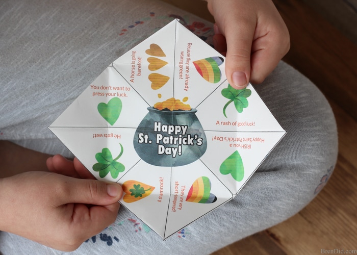 A joke teller is a great St. Patrick’s Day treat for kids. The free printable project (with easy folding instructions) takes less than 5 minutes to complete. The joke teller (sometimes called a cootie catcher or fortune teller) contains 8 fun St. Patrick’s Day jokes for kids and fun Saint Patrick’s Day designs. It’s the perfect non-candy treat for all ages. 