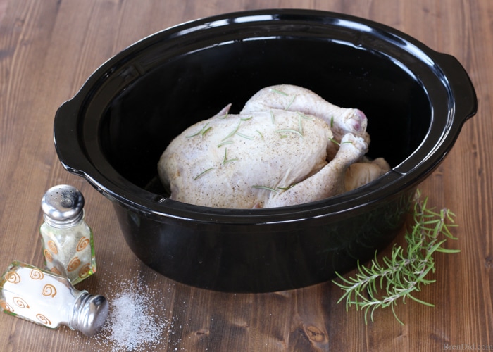 Crazy Easy Roast Chicken in the Slow Cooker - This quick and easy whole chicken recipe will become a staple in your house. It is a healthy alternative to store-bought rotisserie chicken with a wonderful flavor, crispy skin and tender meat. 