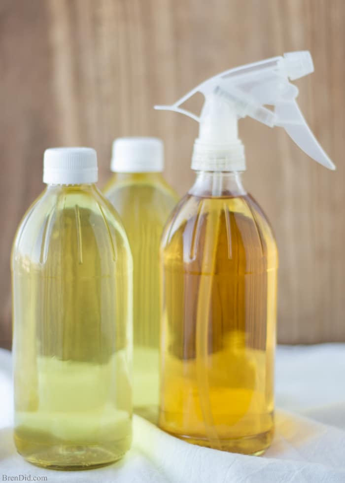How to Make Scented Vinegar for Cleaning- This DIY cleaner made with citrus peels and herbs is easy to make and non-toxic. It cuts through grease with ease. Combines the cleaning power of vinegar and citrus oil. If you love using vinegar for green cleaning but want to make it smell better, try this! All-natural, non-toxic cleaning. No essential oils.