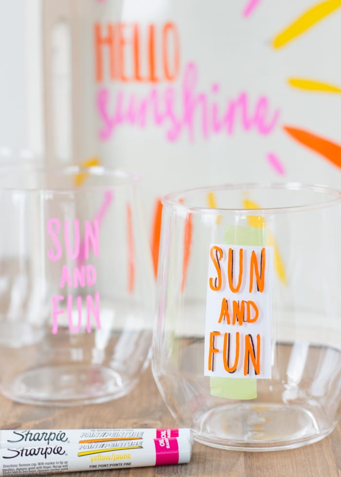 DIY Sharpie Crafts - This custom wine tray with matching glasses requires no artistic ability, stencils, or transfers. If you can trace you can make this craft project! Learn the easy hack for perfect lettering and graphics PLUS get 4 free printable patterns. Oil based Sharpie paint pens make the project mess free. Perfect for a girls’ craft weekend, wine club activity, or Pinterest craft party.
