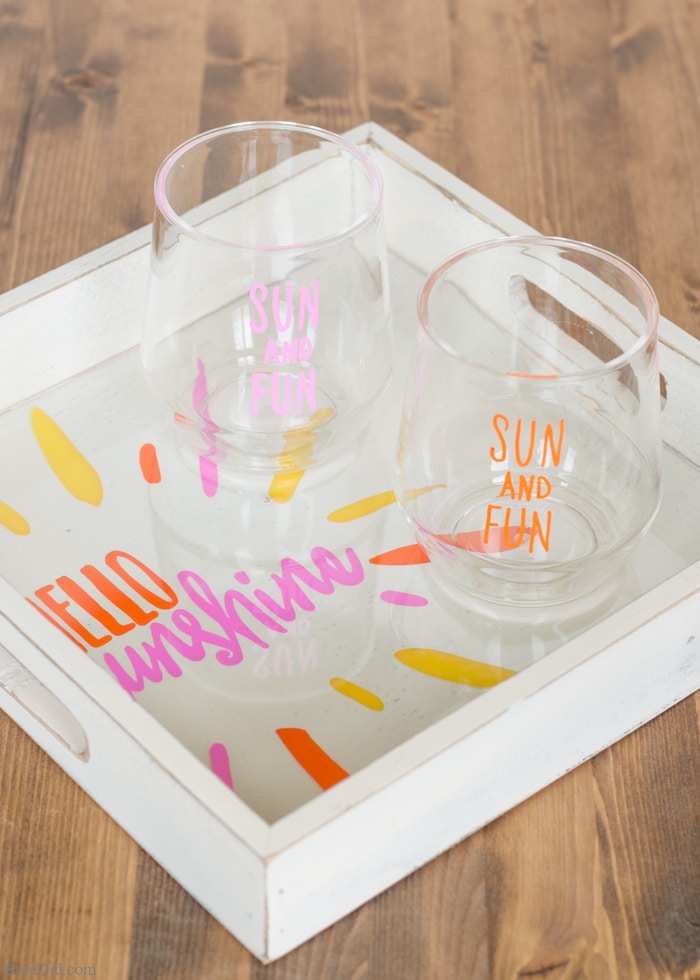 DIY Sharpie Crafts - This custom wine tray with matching glasses requires no artistic ability, stencils, or transfers. If you can trace you can make this craft project! Learn the easy hack for perfect lettering and graphics PLUS get 4 free printable patterns. Oil based Sharpie paint pens make the project mess free. Perfect for a girls’ craft weekend, wine club activity, or Pinterest craft party.
