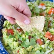 This two-way guacamole recipe makes a great basic guacamole and then turns half into spicy supreme guacamole. Perfect for families who loved different kinds of guacamole or serving at parties.