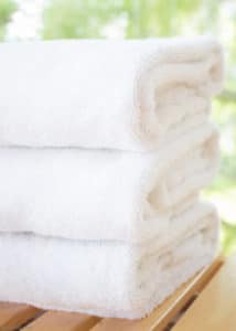 Ever encountered the musty, moldy odor of a smelly towel? The less-than-fresh scent is caused by bacteria. Gross but true! Learn how to naturally eliminate laundry room bacteria and keep towels fresh with this green cleaning tutorial.