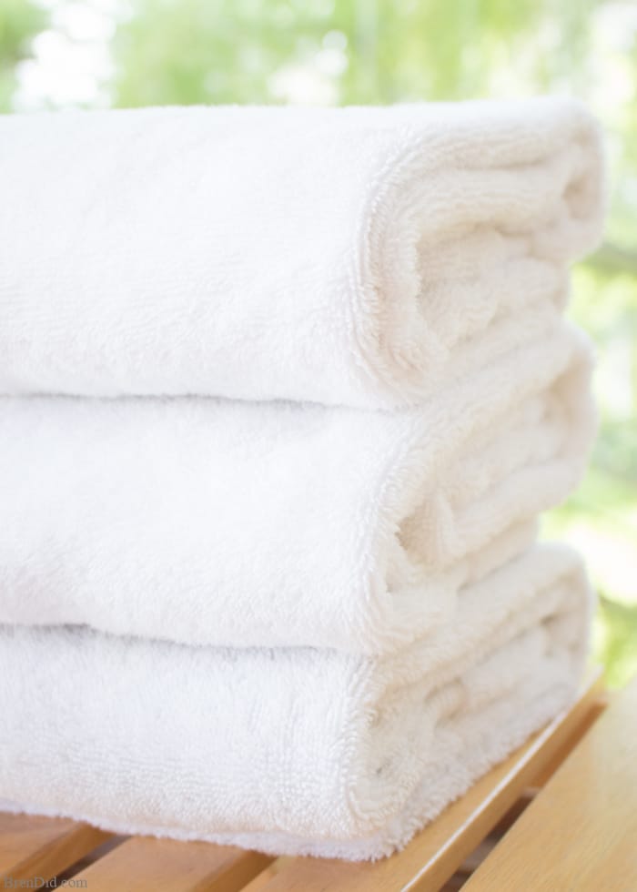 Ever encountered the musty, moldy odor of smelly towels? The less-than-fresh scent is caused by bacteria. Gross but true! Learn how to naturally eliminate laundry room bacteria and keep towels fresh with this green cleaning tutorial.