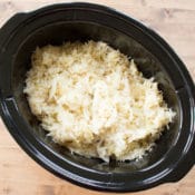 This easy recipe combines apples, pork roast and sauerkraut in the crock pot for a tasty dinner that takes just minutes to prepare. My family loves it for the tasty combination of flavors, I love it because it is a simple “throw and go” recipe for the slow cooker.
