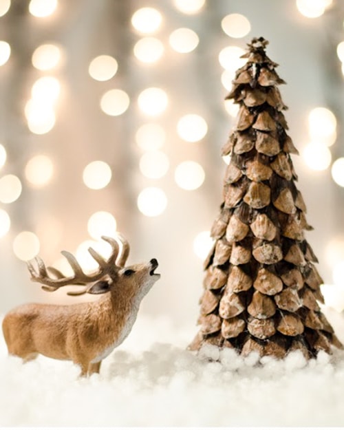 Decorating with pine cones for the holidays is free and beautiful. These 30 easy crafts add pine cones to your home decor this winter.