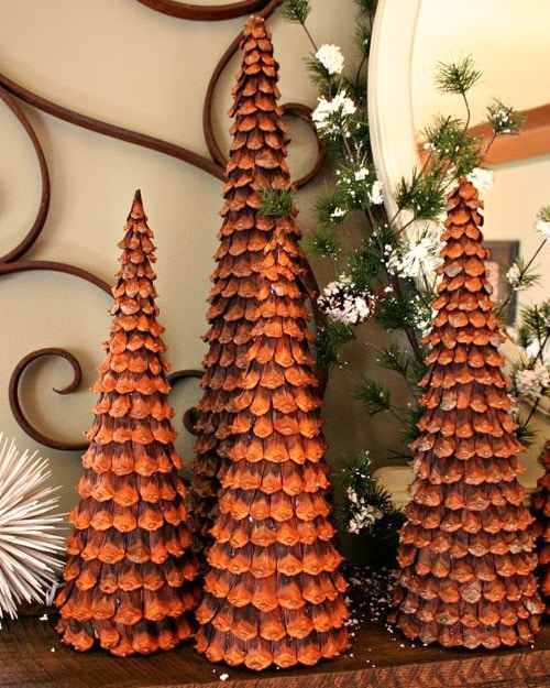 Decorating with pine cones for the holidays is free and beautiful. These 30 easy crafts add pine cones to your home decor this winter.