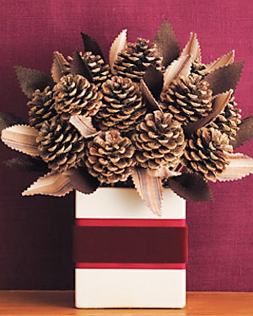 Decorating with pine cones for the holidays is free and beautiful. These 30 easy crafts add pine cones to your home decor this winter.