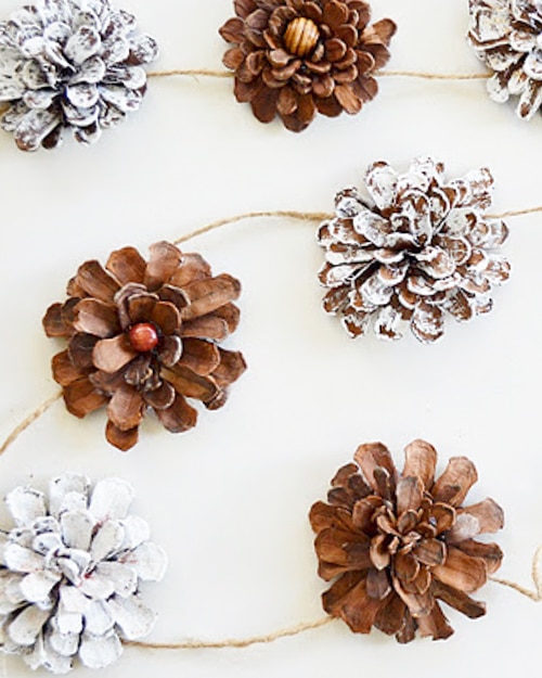 Decorating with pine cones for the holidays is free and beautiful. These 30 easy crafts add pinecones to your home decor this winter.