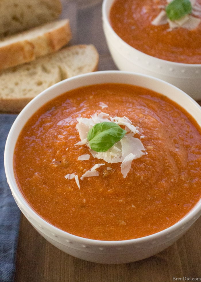 Creamy, comforting, and cheesy this healthy slow cooker tomato basil parmesan soup is packed with vegetables that give it incredible flavor without all the fat and calories. Shhh… no one will know it’s anything but delicious creamy tomato soup!