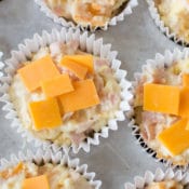 These easy breakfast muffins taste like ham, egg, and cheese biscuits. They are perfect for busy morning when you don't have time to cook but want to serve a hot, homemade meal.